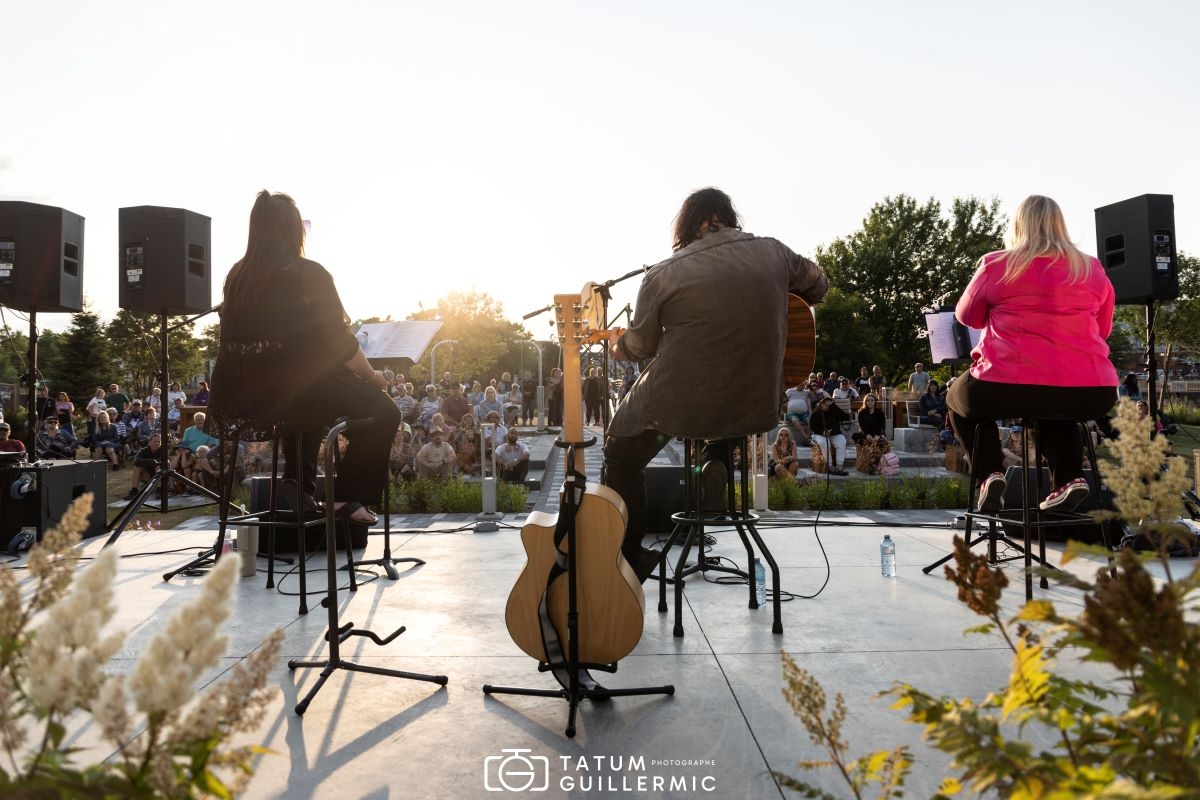 The Cogeco Agora - A stage and an outdoor screen in a magical setting.